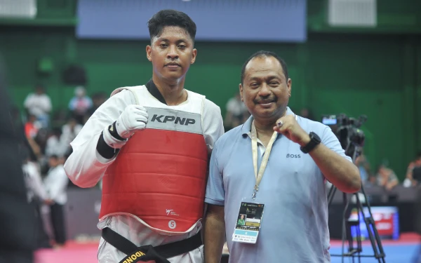Foto Rizki Anugrah Prasetyo bersama Ketua KONI Jatim M Nabil. (Foto: KONI Jatim)