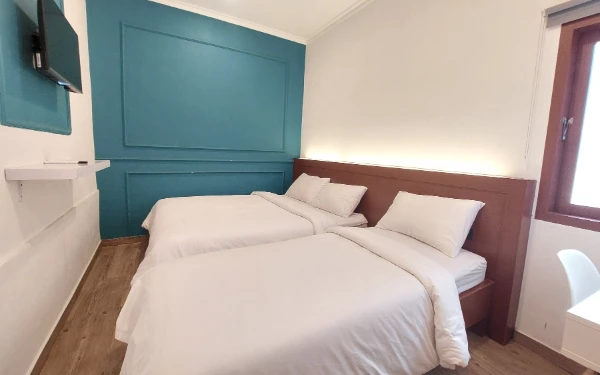 Foto View Family Room untuk 3 orang di RICHE Heritage Hotel Malang. (Foto: Dok. RICHE Heritage Hotel Malang)