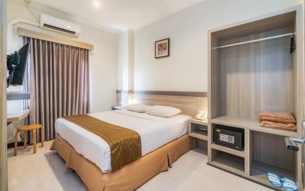 Foto Pemandangan kamar yang bersih dan rapi di Everyday Smart Hotel Malang. (Dok. Everyday Smart Hotel Malang)