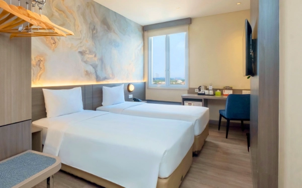 Foto Zest New dengan fasilitas dua tempat tidur single.  (Foto: Zest for Ketik.com)