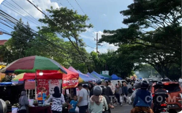Thumbnail Berita - Warga Kota Malang Wajib Tahu! Beli Takjil Sambil Naik Kendaraan Kini Bisa Kena Semprit